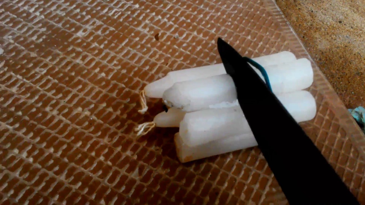 como cortar una vela por la mitad